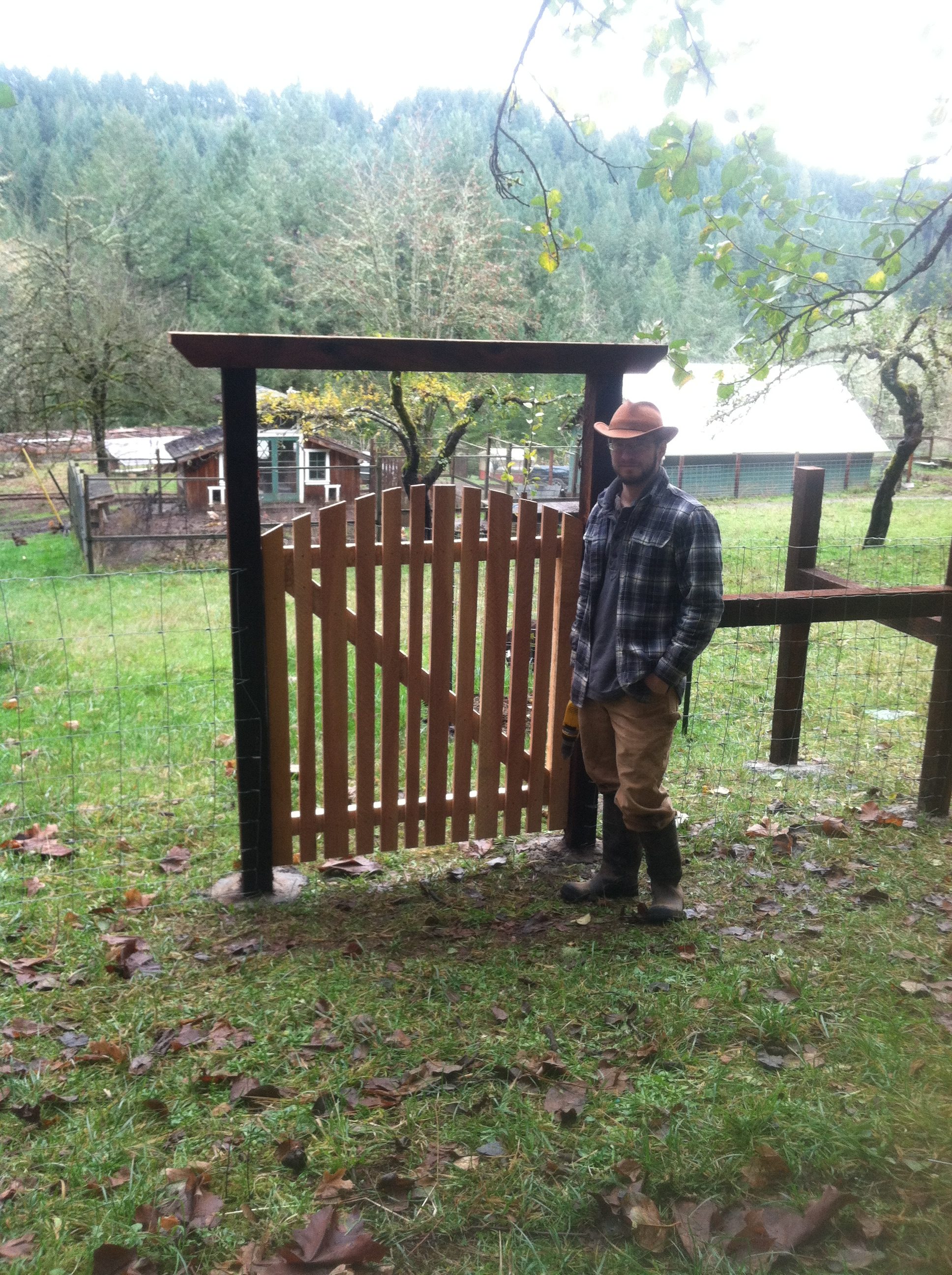 Alex completes a cedar gate for the upper orchard
